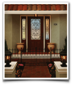 door2-e1627569243648 A welcoming house entrance with elegant doors and a lantern-lit path creates a charming, inviting atmosphere.