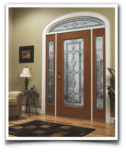 door4-e1627569185976 An elegant wooden entry door with glass accents welcomes warmth into a cozy, art-adorned living room.