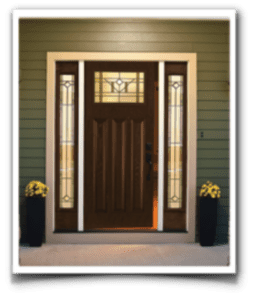 door6-e1627569120213 A brown entry door with side glass panels stands out against green walls, inviting with bright yellow flowers.